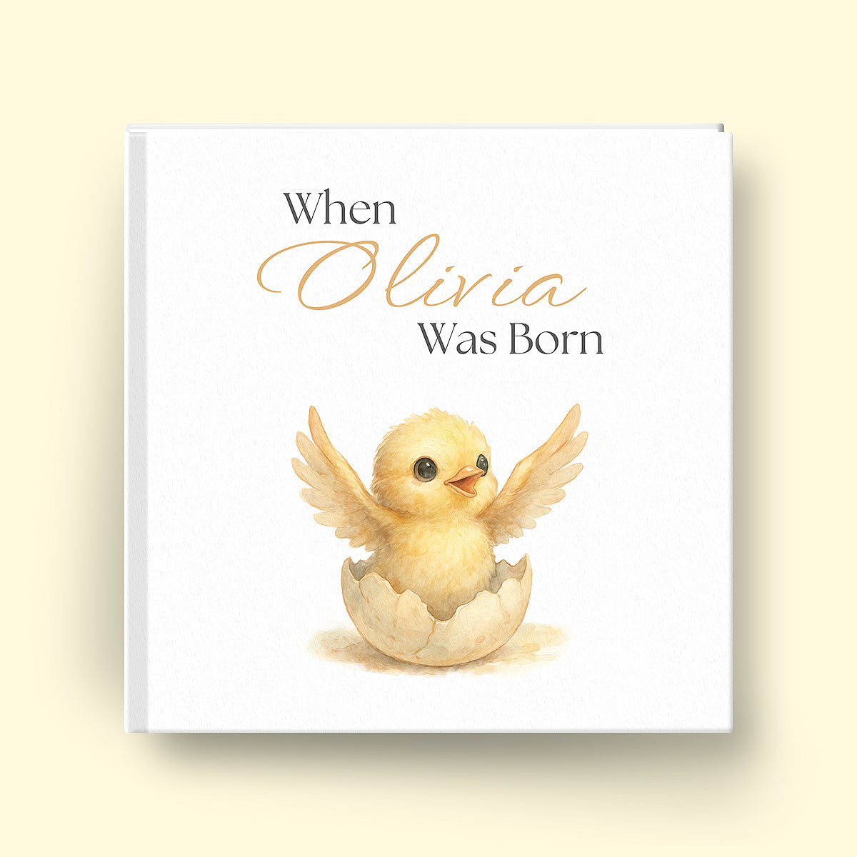 Book titled 'When Olivia Was Born' with a chick illustration on a white background
